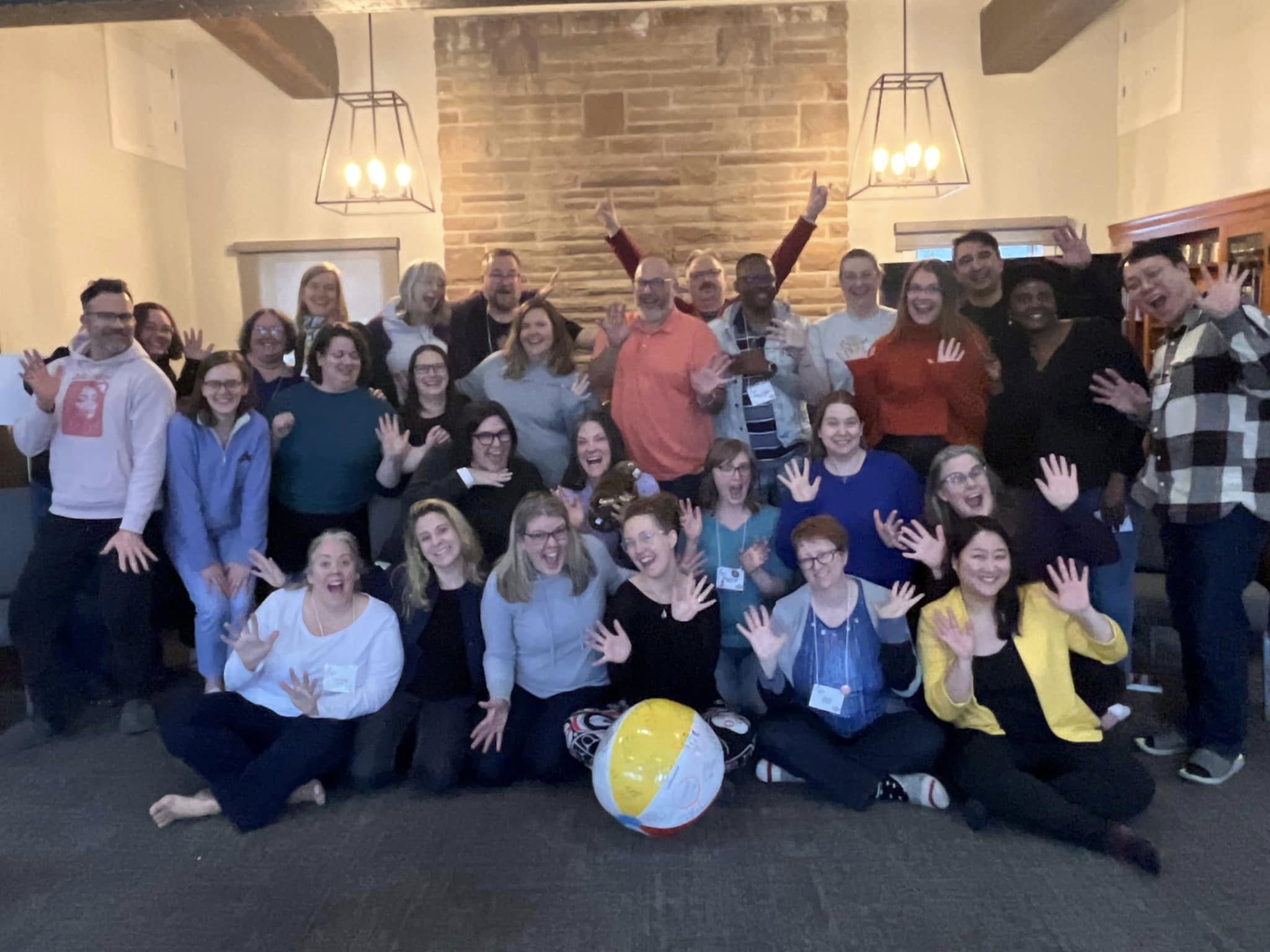 A group of participants at (Re)Generate pose together