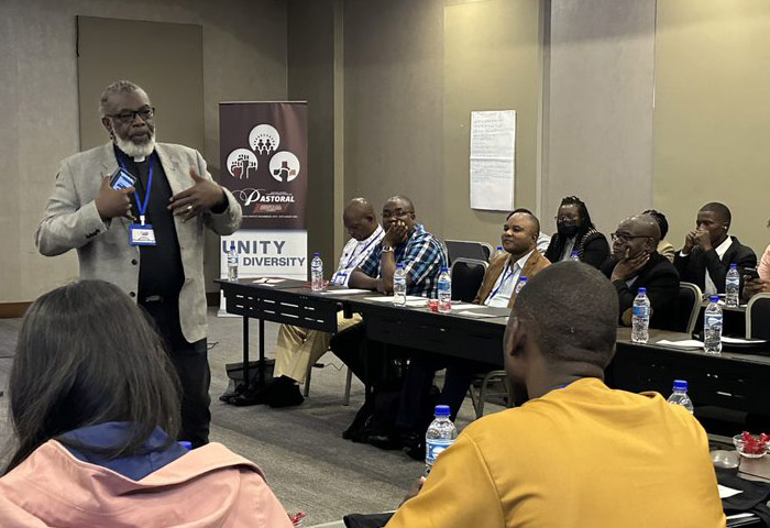Michael Blair speaking to a group of people.