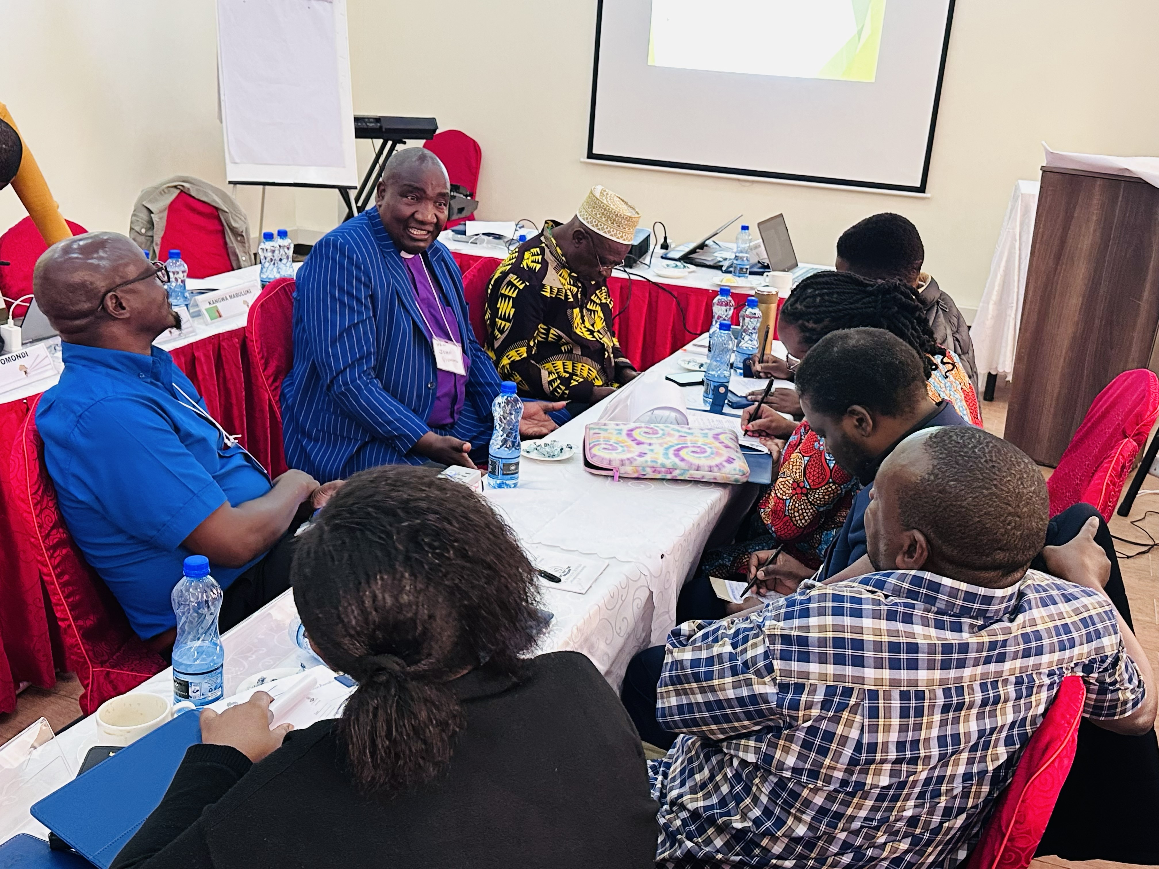 People gathered around a table for a workshop