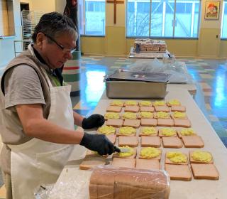 Man making sandwiches