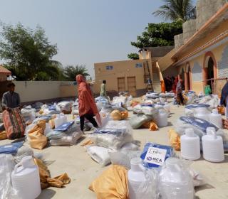 ACT Alliance distributes hygiene and shelter kits, jerry cans, and mosquito nets after flooding in Pakistan. 