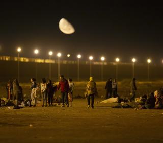 A line of migrants at the border crossing between Ciudad Juarez and El Paso