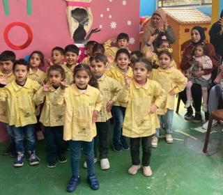 A group of children attending kindergarten class.