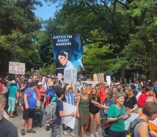 A crowd marches in support of the community of Grassy Narrows 