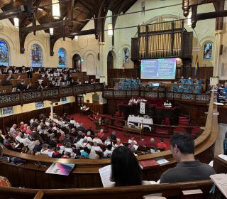 Guests and choir at the Centennial Service in Gower Street United Church