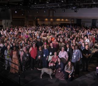 A large group of participants indoors at GC45