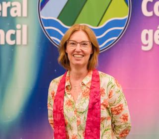 Kimberly Heath in front of the GC45 logo