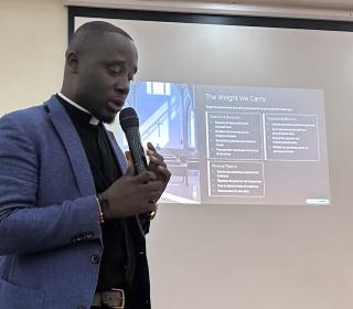Rev. Adera leading a session at the Faith Beyond Borders workshop