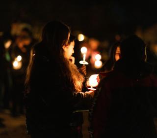 A vigil full of candle holders