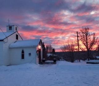 A sunset behind Hillcrest United Church