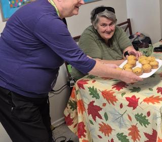 A volunteer and client at Carlington Community Connection