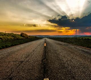 A sunset over a highway