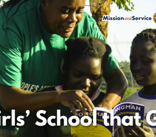 A teacher and girls at school in Zambia