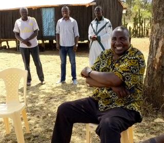 Photo of Ven. John Gichumu with community leaders in Kapenguria, Kenya