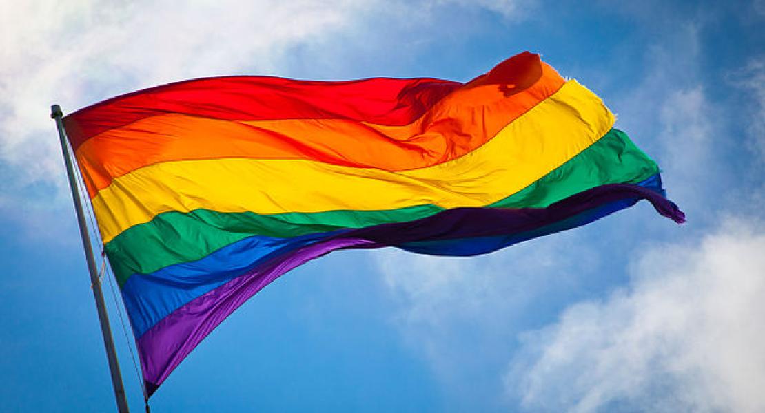 Rainbow flag flapping in the breeze