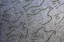 A drawing of doves in flight