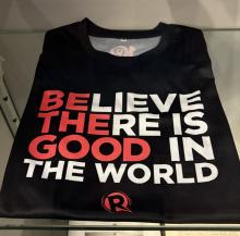 A t-shirt that reads "Believe there is good in the world"