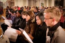 A diverse group of youth delegates at the opening worship of the ACT Alliance General Assembly in Uppsala, Sweden.