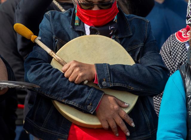 Mi’kmaq drummer pauses during prayer