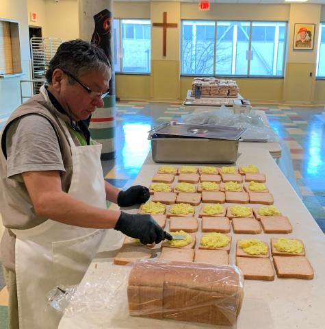 Man making sandwiches