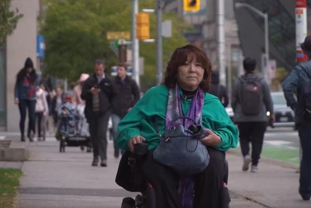 Lynda on a city street