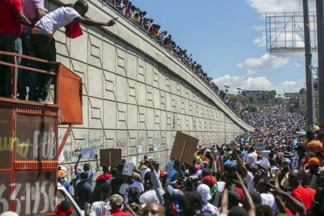 Image: Huge crowds flood the street demanding the resignation of the Haitian president,in Port-au-Prince, Haiti, Feb. 28, 2021