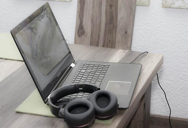 Laptop and Headphones in home office