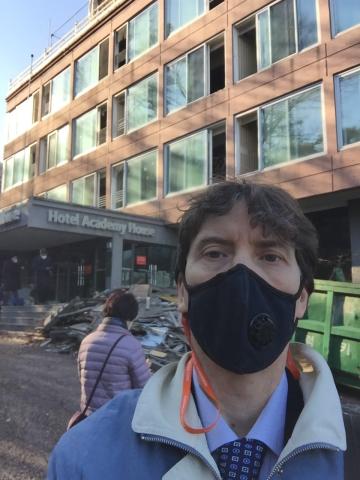 The author, John Egger, in a pandemic mask, takes a selfie in front of the PROK former Academy House in Korea.