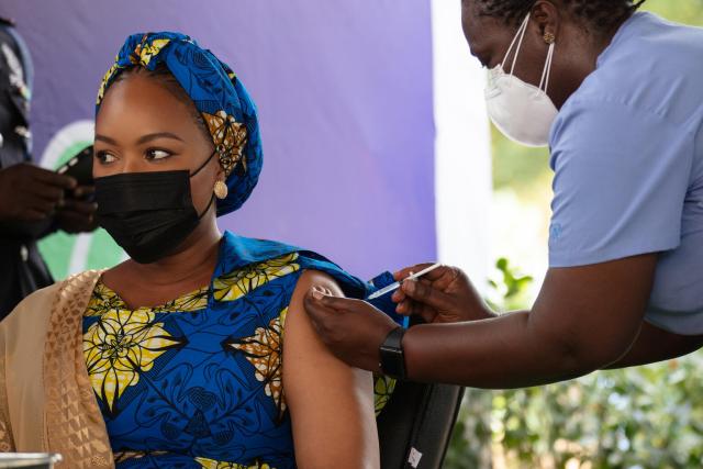 A woman receives a COVID-19 vaccine