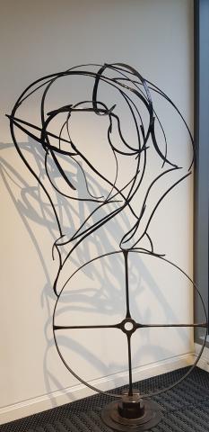 free form sculpture made of black metal