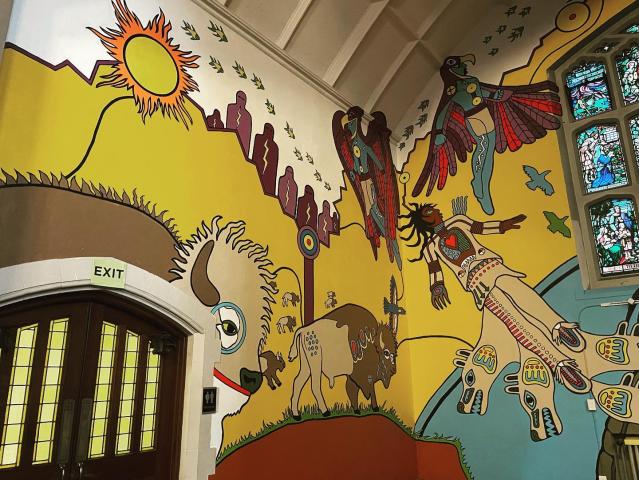 A view of a striking mural by Indigenous artist Philip Cote based on an Objibaway Creation Story.