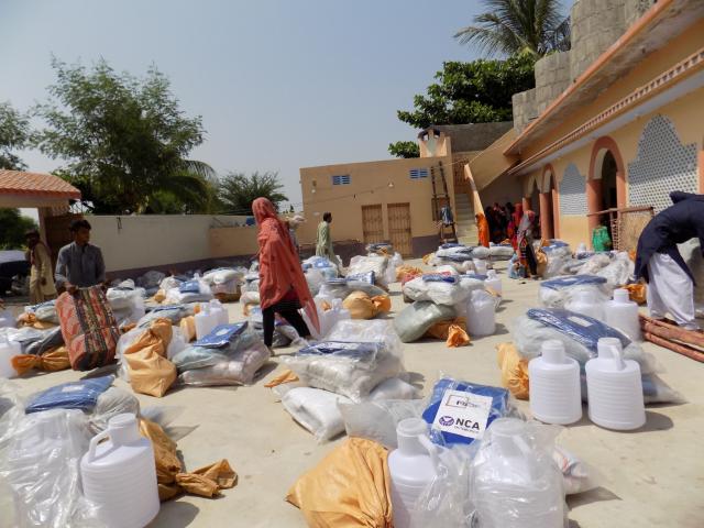 ACT Alliance distributes hygiene and shelter kits, jerry cans, and mosquito nets after flooding in Pakistan. 