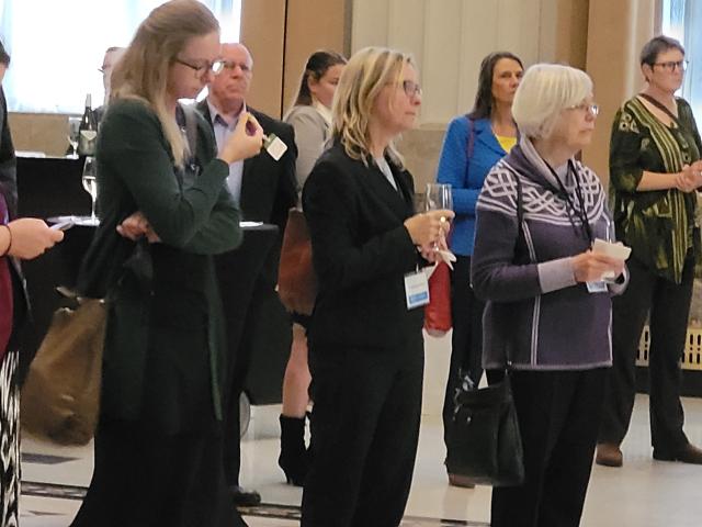 A group of volunteers and staff are recognized for their work on the Hunger on the Hill campaign.