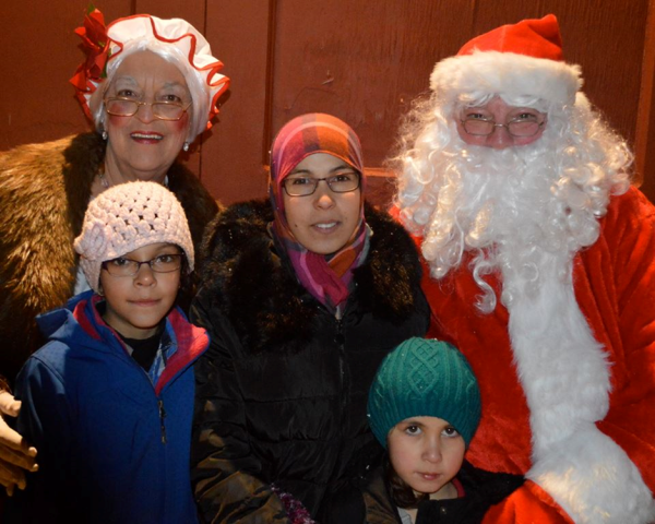 Members of the St. Andrews United Church and Lifeline 224 with AL NASAAN’s family on the Christmas eve