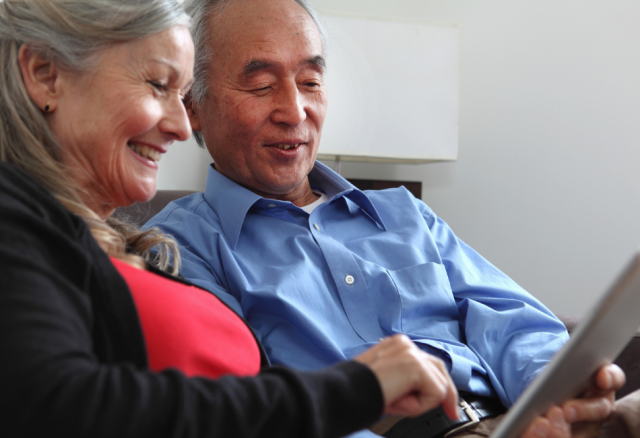 Older couple using a tablet