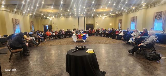 Attendees to the National Indigenous Spiritual Council sit in the closing circle