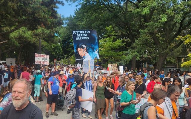 A crowd marches in support of the community of Grassy Narrows 