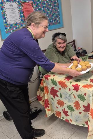 A volunteer and client at Carlington Community Connection