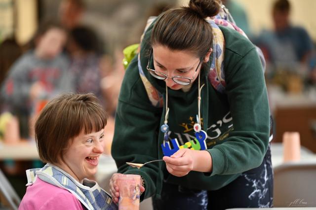 A volunteer and camper at Pearce Williams Summer Camp Retreat 