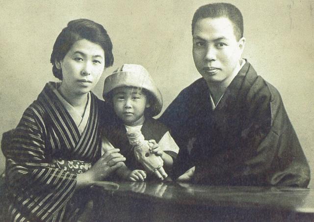A Japanese family of 3 pictured in black and white