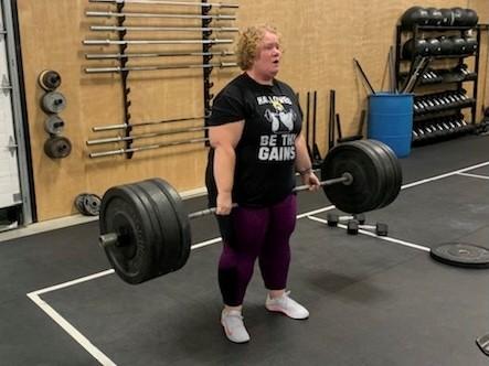 A woman lifting weights