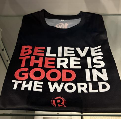 A t-shirt that reads "Believe there is good in the world"