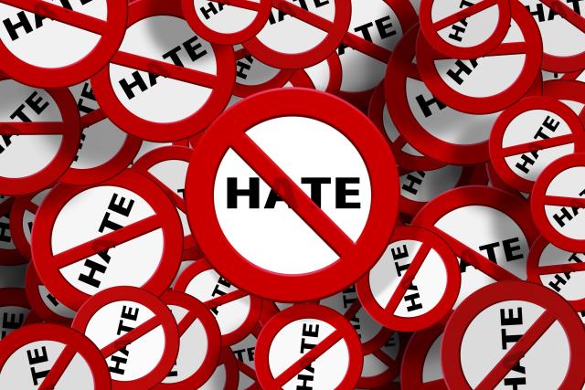 The word hate crossed out with red bar