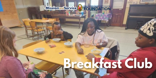 A family eating breakfast in a church setting