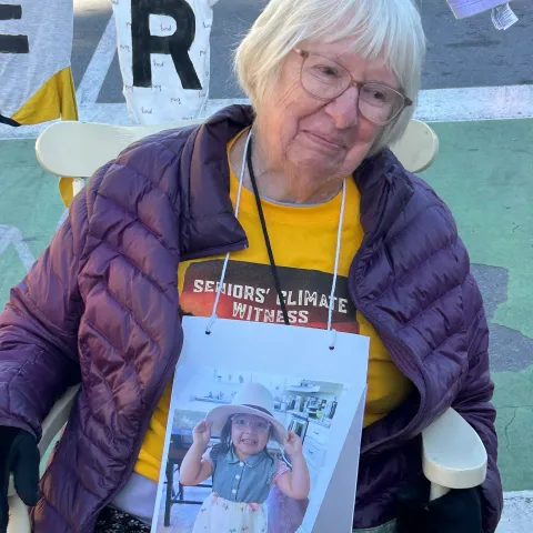 81-year-old Jill taking part in the Seniors Climate Witness action.