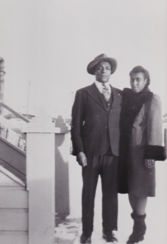 A Black couple in 1940s attire