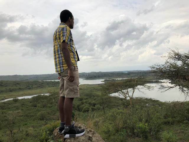 Author Adam Kilner looking out over the Tanzanian landscape. The author Adam Kilner looking out over the Tanzanian landscape.