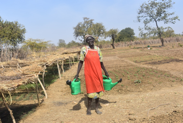 Amei is participating in the food assistance project implemented by Tearfund Canada and funded by CFGB and The United Church of Canada. Amei on her land in South Sudan