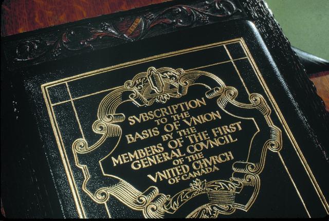 Photo of book containing The United Church of Canada's Basis of Union, 1925