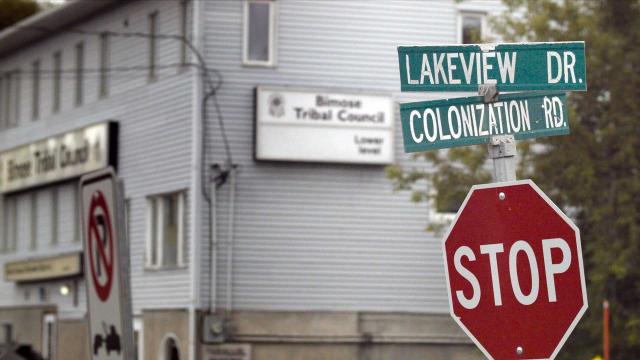 A sign for Colonization Road in Kenora, Ontario.